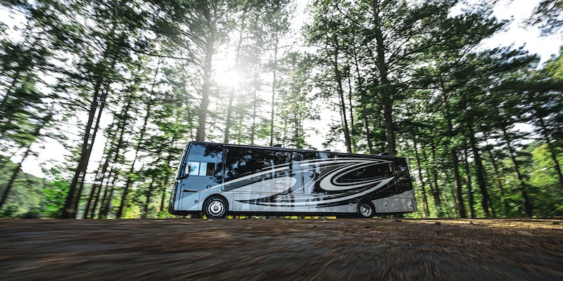 Aria diesel pusher motorhome in woods